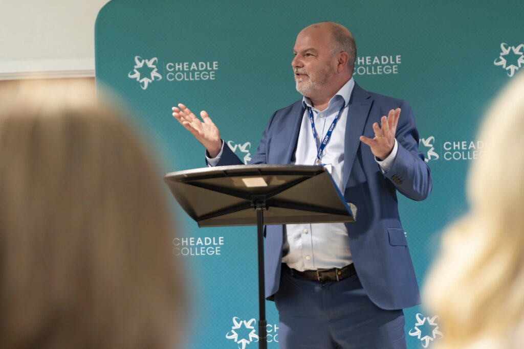 CEO James Scott on stage at the new Cheadle College campus